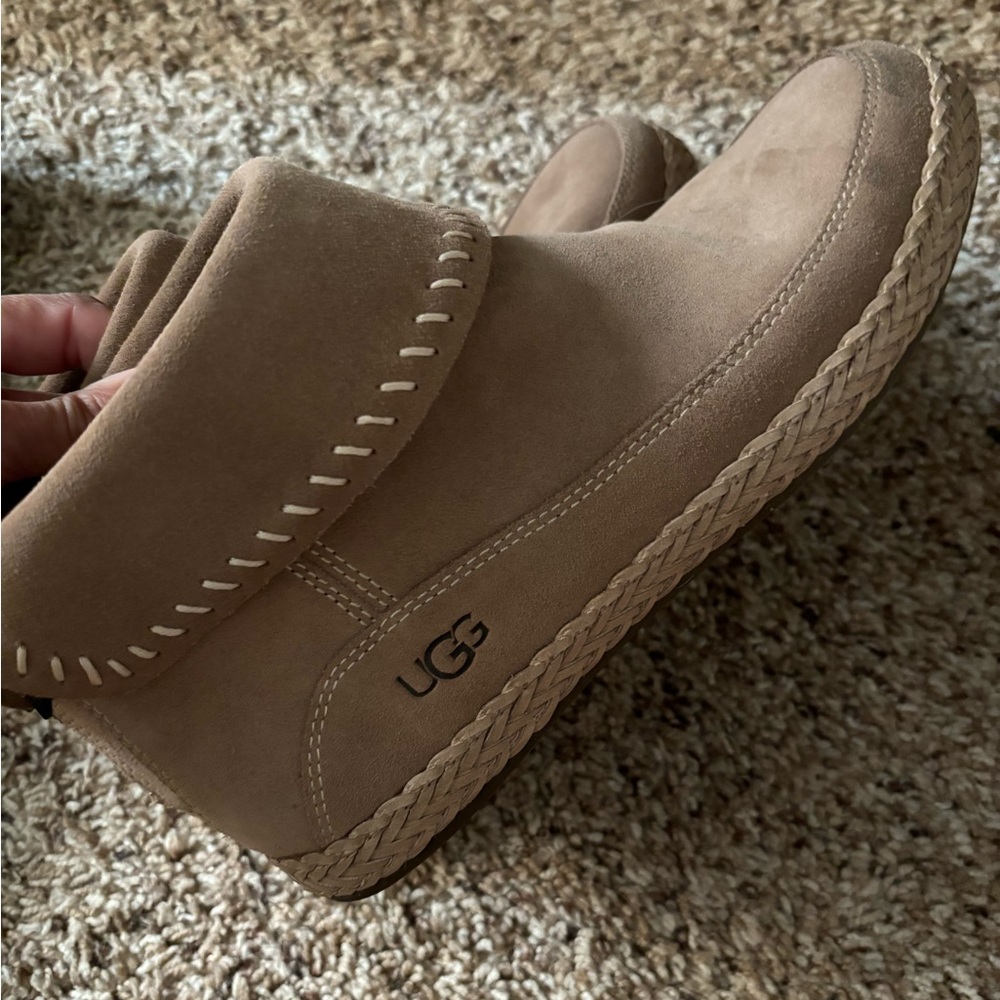 UGG, tan boot zips up the back of the foot very comfort